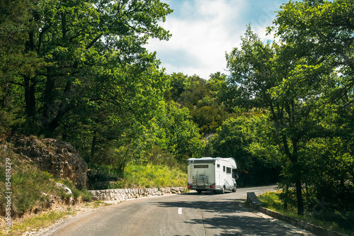 Motorhome Car Goes On Road On Background Of French Mountain Nature