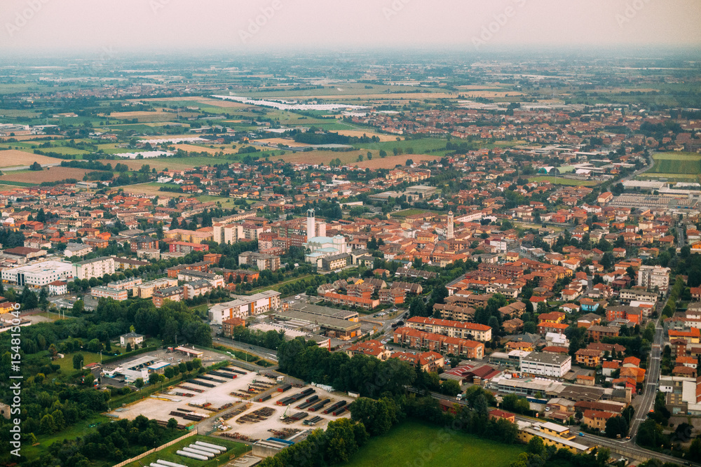 Bergamo, Italy. Aerial View Of Cityscape From Plane Flight