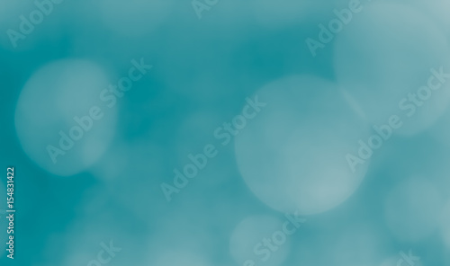 Bokeh Background Dark moderate cyan.