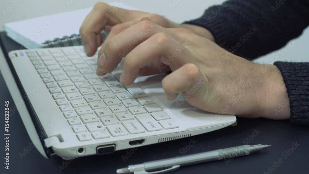 Worker Office Man Work On Laptop, Use Keyboard and Make an Online Purchase Payment Worker Office Man Work On Laptop, Use Keyboard and Make an Online Purchase Payment