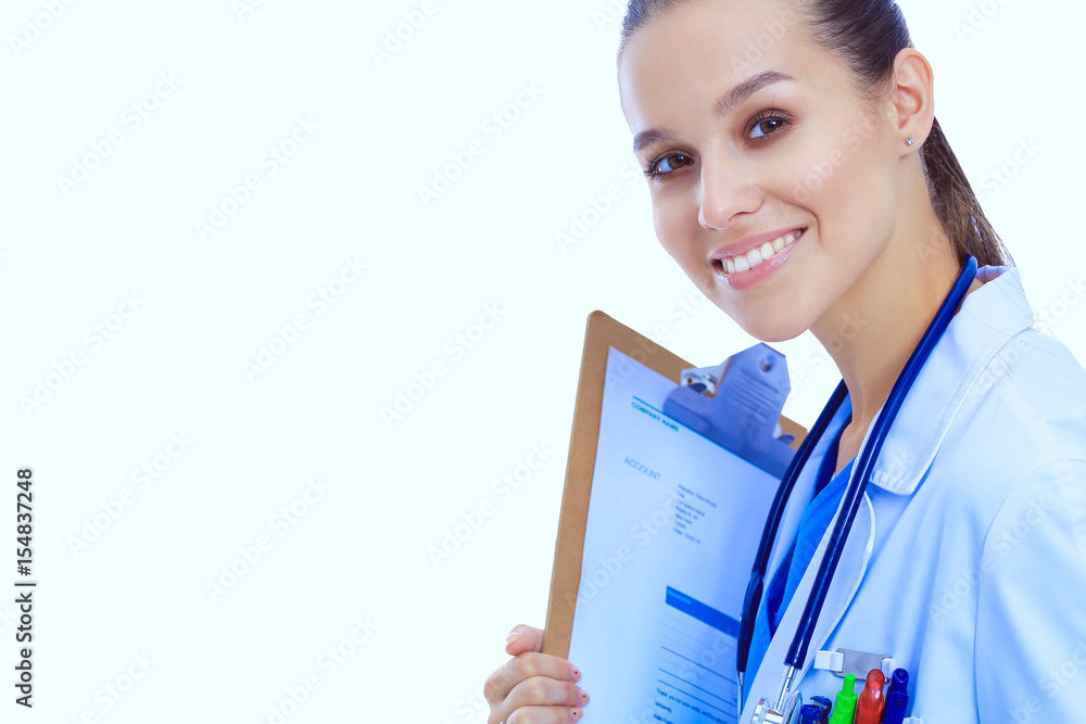 Young female doctor with clipboard standing on white background Young female doctor with clipboard standing on white background