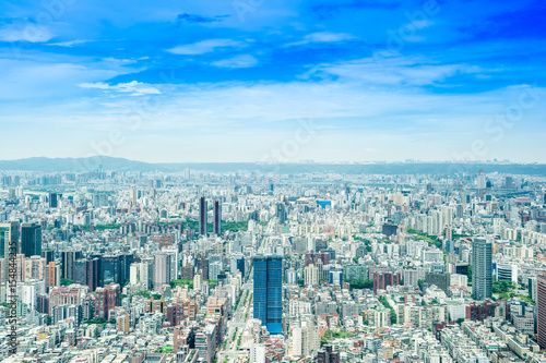 Asia Business concept for real estate and corporate construction - panoramic modern cityscape building bird eye aerial view under sunrise and morning blue bright sky  shot in Taipei 101  Taiwan