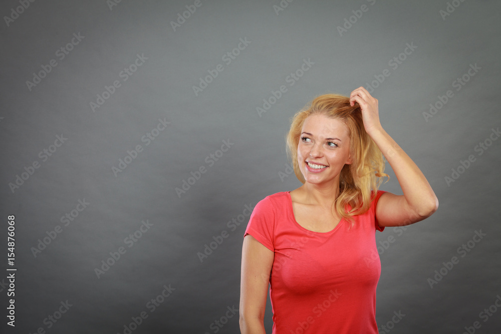 Happy positive blonde woman gesturing hands Happy positive blonde woman gesturing hands