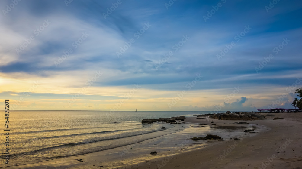 Sunlight shimmering water surface on tropical beach Sunlight shimmering water surface on tropical beach