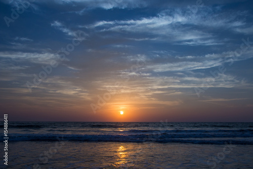 Amazing sunset at Arambol beach, North Goa, India © allenkayaa