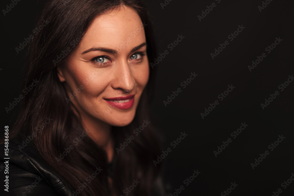 happy woman smiling at the camera happy woman smiling at the camera