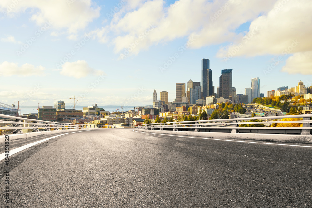 empty road with modern city empty road with modern city