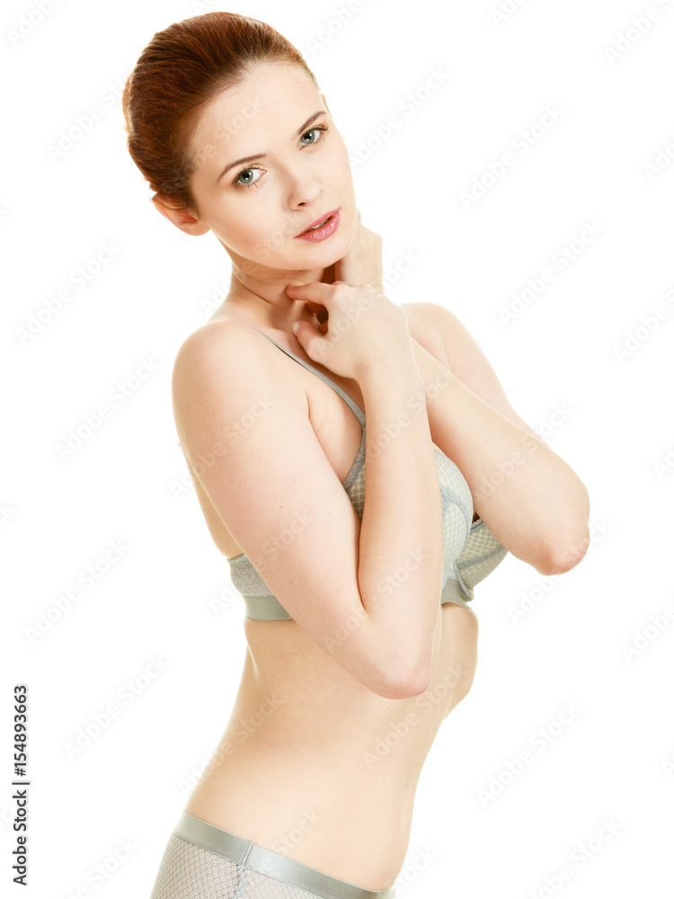Obraz premium Attractive slim woman in grey matching underwear
