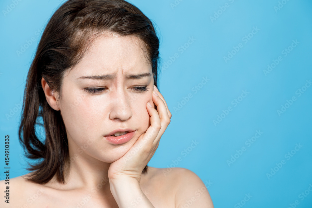young girl getting a toothache. oral trouble concept. stomatitis. young girl getting a toothache. oral trouble concept. stomatitis.