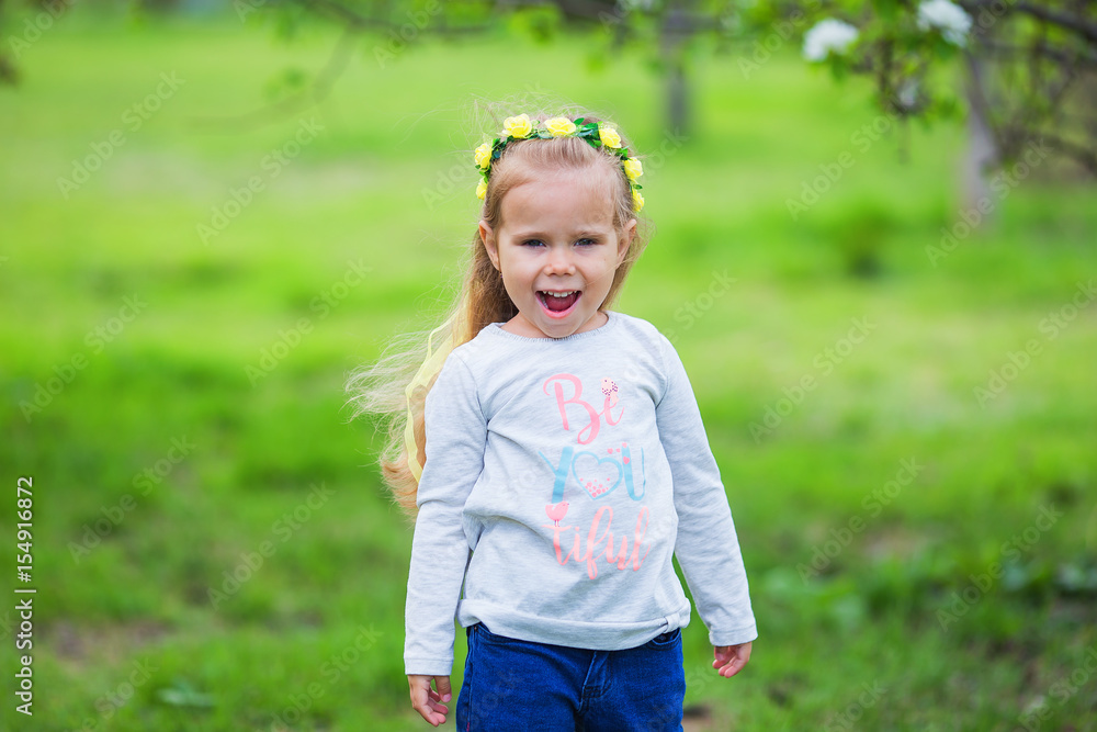 Cheerful active joyful girl in a summer park Cheerful active joyful girl in a summer park