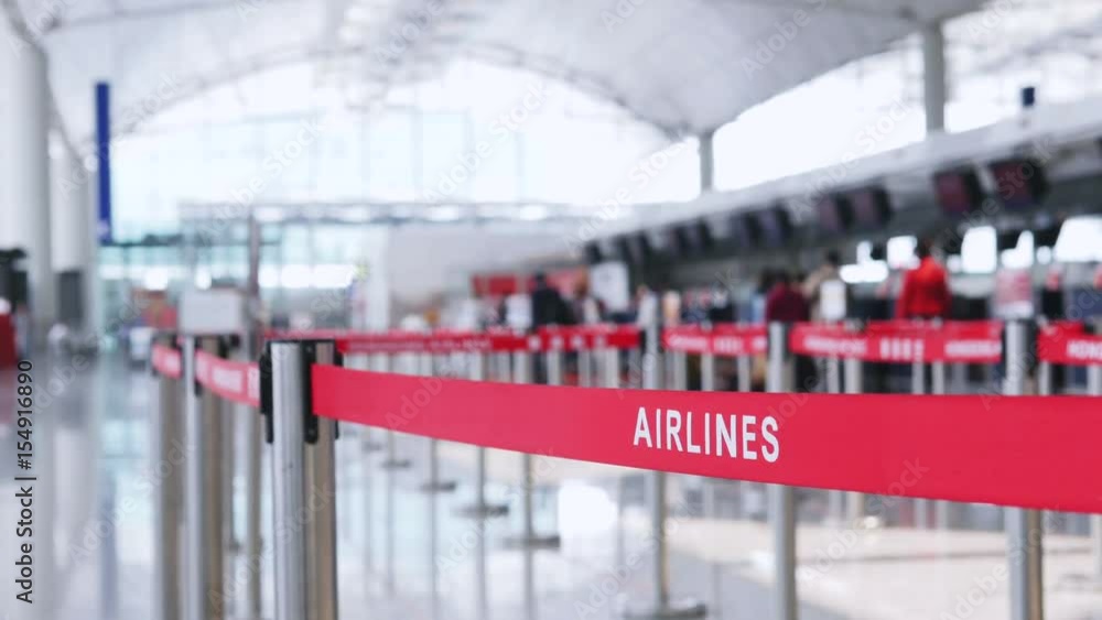Airline and Check In Counters Out focused check in counters in an international airport. Focus