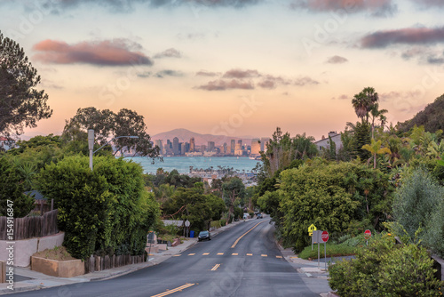 Sunset view of the city San Diego with city streets.