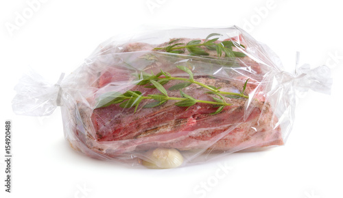 Slika na platnu Fresh meat packaged in a sleeve for baking