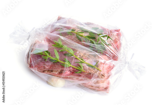 Slika na platnu Fresh meat packaged in a special sleeve for baking