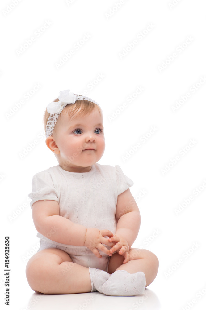 Baby girl in white clothes isolated on white Baby girl in white clothes isolated on white