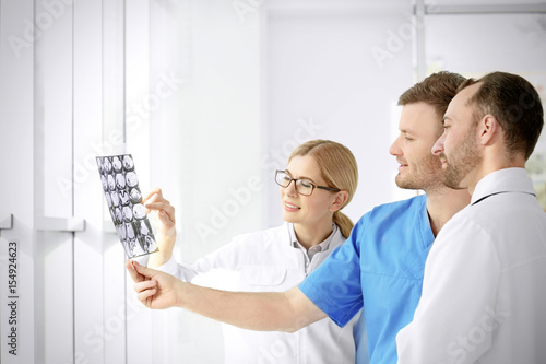 Group of doctors looking at...