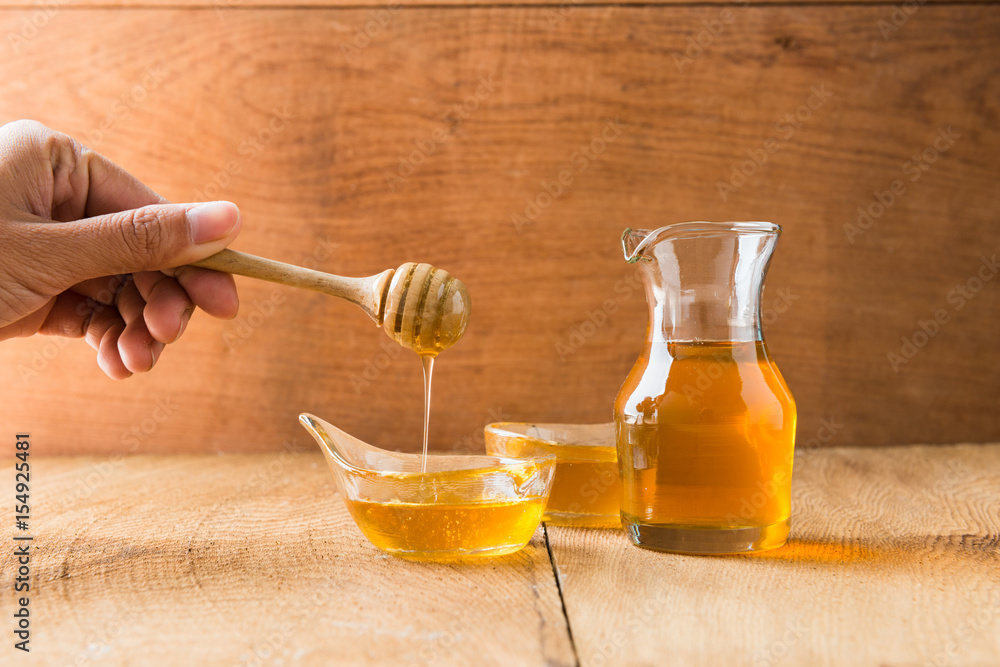 Honey with dipper Honey with dipper