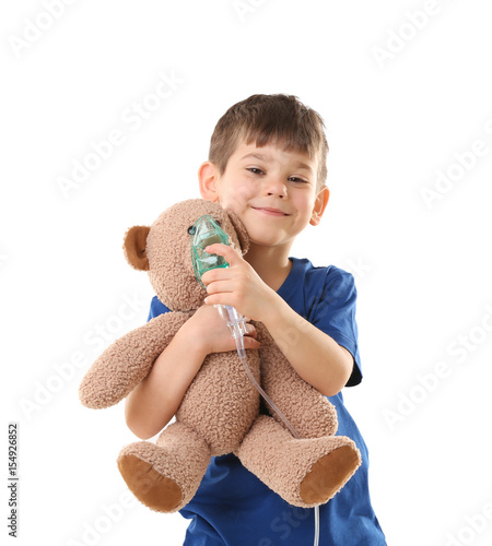 Cute little boy holding neb...