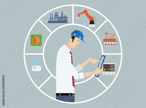 Industry 4.0 Factory Automation Concept: production chain controlled by engineer with tablet PC.