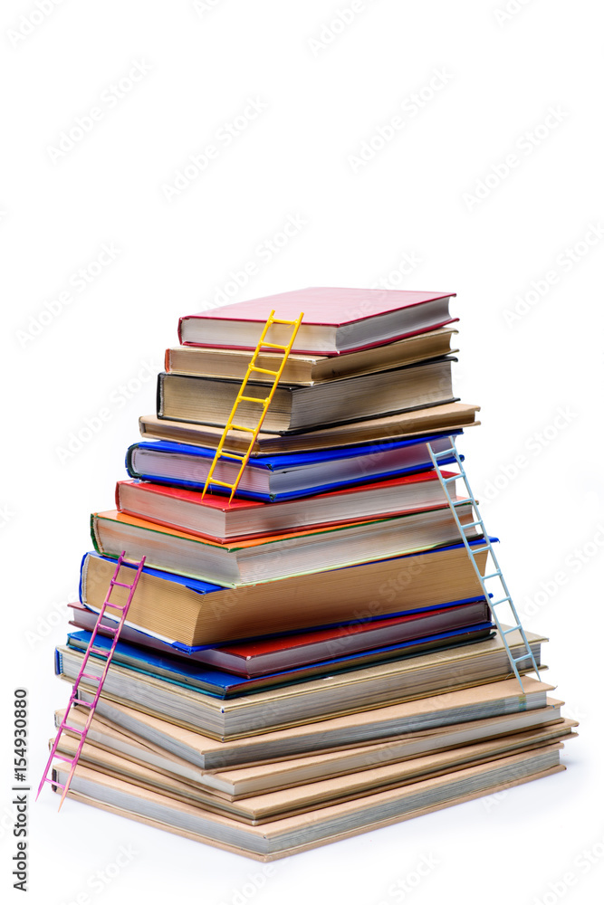 stack of books with ladders isolated on white, educational concept stack of books with ladders isolated on white, educational concept