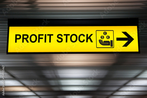 Business financial investment concept :stock money profit yellow sign with icon and arrow
