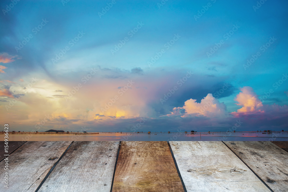 Selected focus empty wooden table and view of cloud and blue sky background image. for your photomontage or product display.	