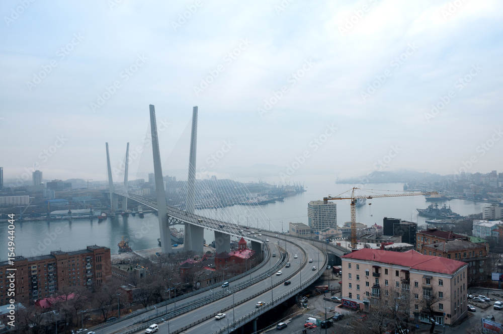 Russia, Vladivostok, April 8: Bridge over Golden Horn Bay