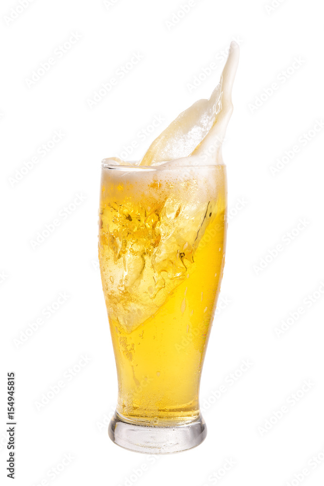 Beer splashing out of glass isolated on white background.
