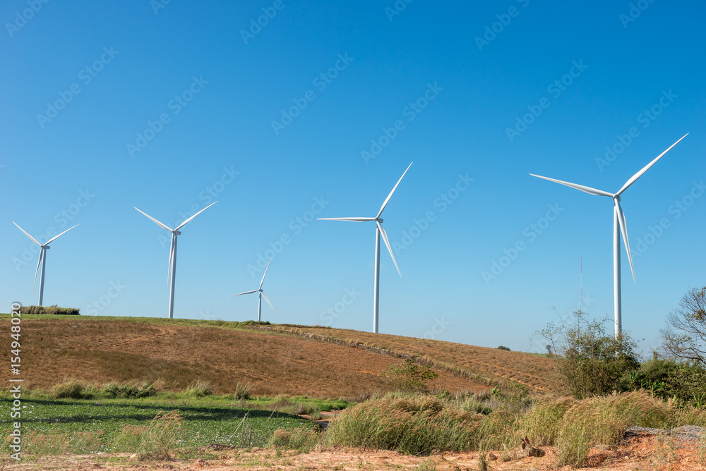 Wind turbines convert wind kinetic energy into electrical powerr. clean power Wind turbines convert wind kinetic energy into electrical powerr. clean power