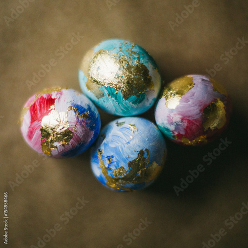 Three colorful handmade easter eggs isolated