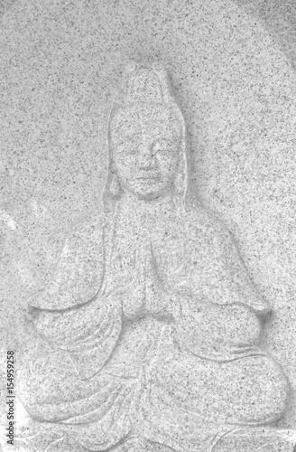 buddha statue on stone