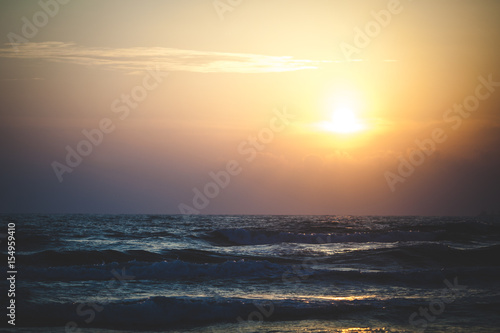 Beautiful sunset over the ocean. Sunrise in the sea.