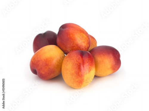 Nectarines on a white background