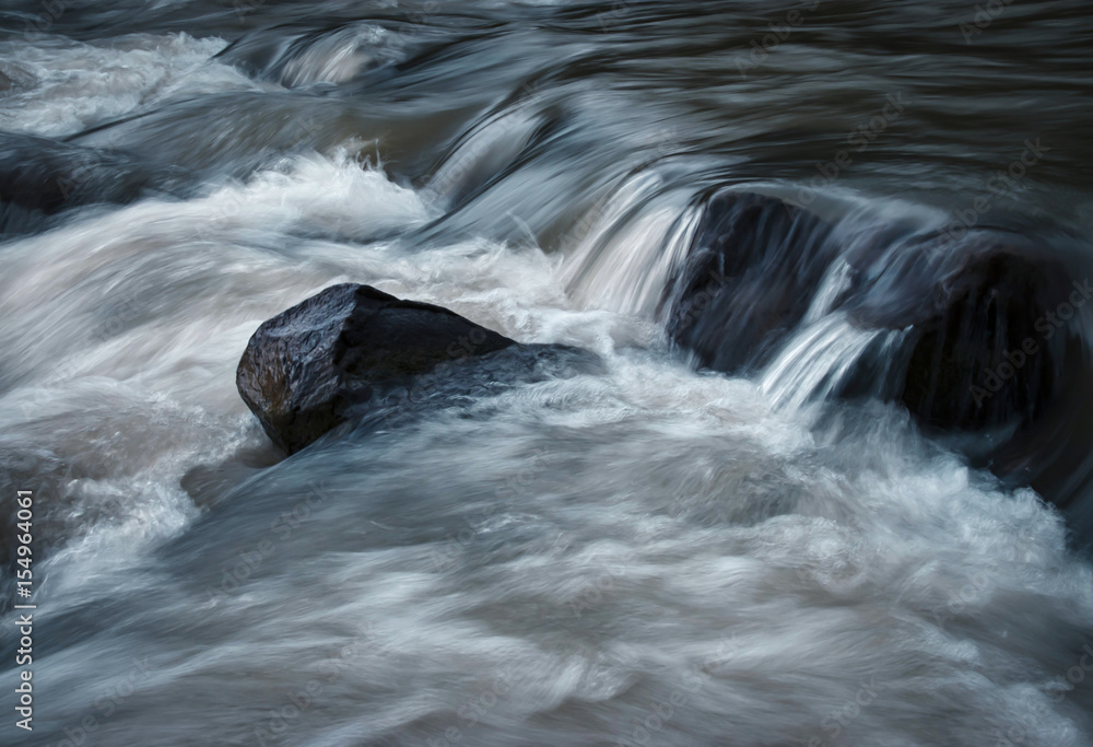 View of the wild water of the river View of the wild water of the river