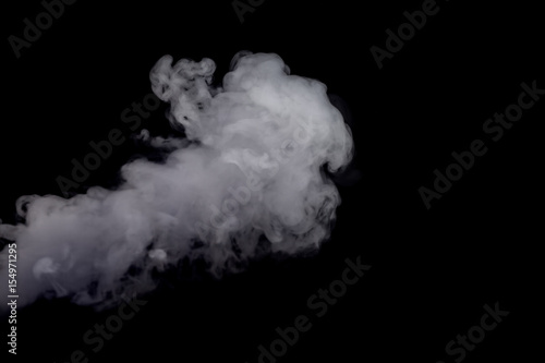 Abstract white smoke against dark background