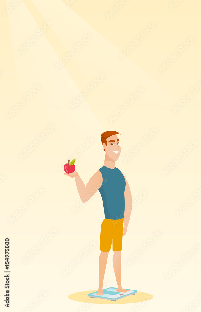 Man standing on scale and holding apple in hand.