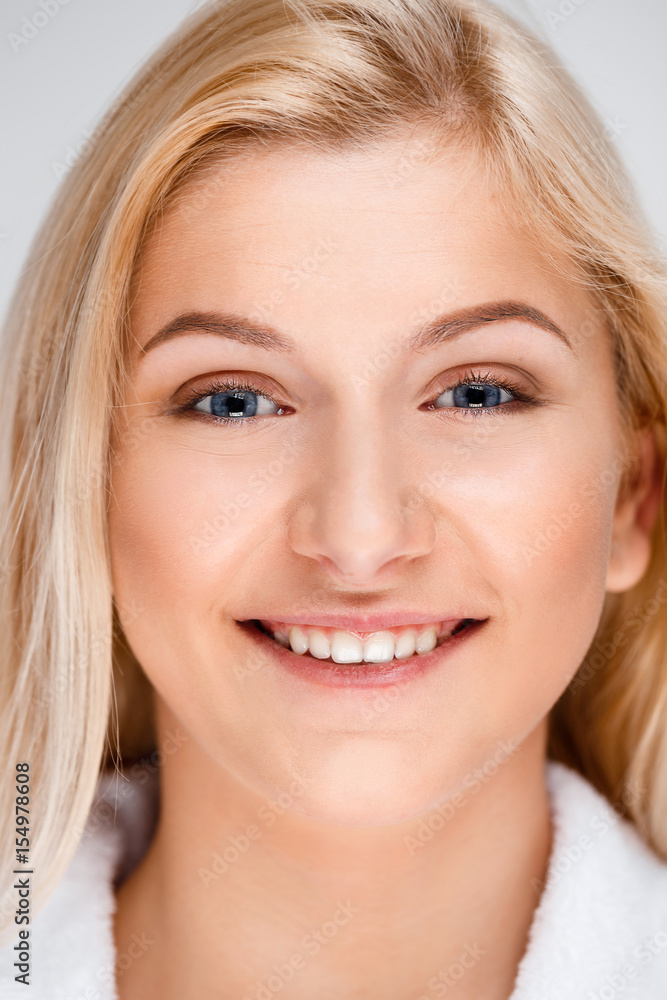 Portrait of young pretty girl over white background. Portrait of young pretty girl over white background.