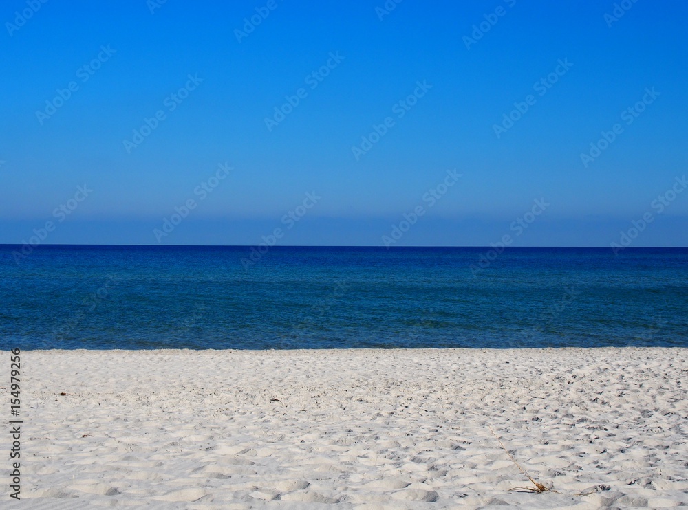 Obraz premium Sea stripes sky water sand symmetry beach