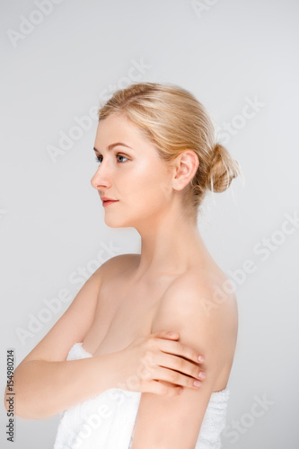 Portrait of young pretty girl over white background.