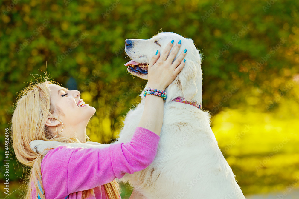 Woman enjoying park with dog Woman enjoying park with dog