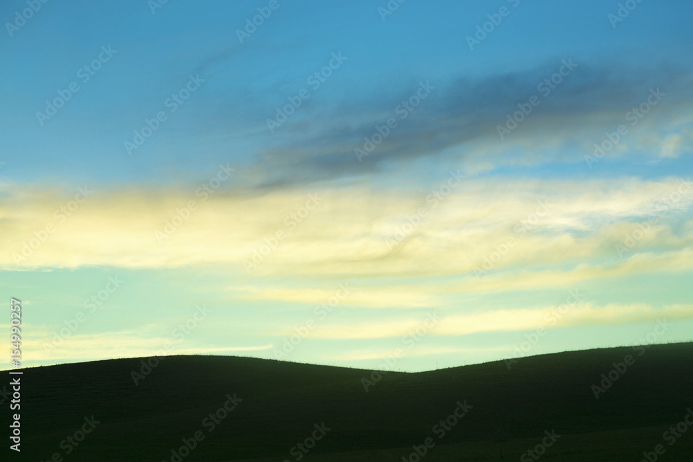 Sunset and sunrise sky background and silhouette of hills Sunset and sunrise sky background and silhouette of hills