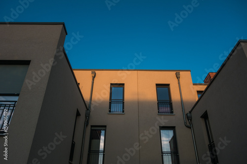 modern architecture in darken colors with copy space in the sky © Robert Herhold
