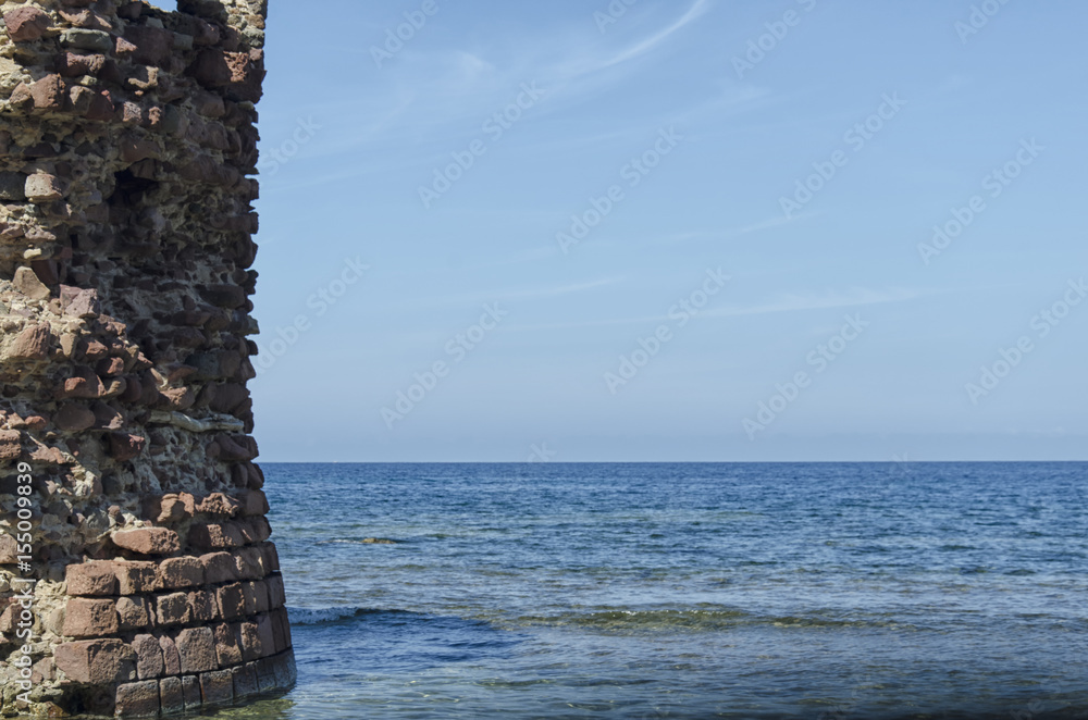 Ruin of tower emerges from sea