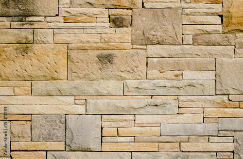Wall made of sandstone blocks and smaller pieces