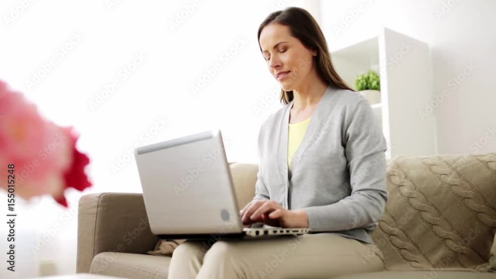 happy woman with laptop computer at home happy woman with laptop computer at home