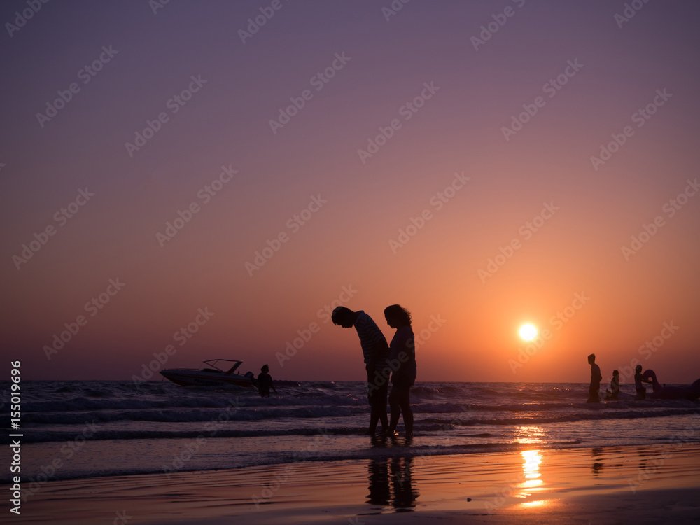 CHONBURI- April 23 : silhouette shadow of couple in love walking on beach with sunset. concept of holiday beach., holiday in Thailand on April 23, 2017 in Chonburi, Thailand.