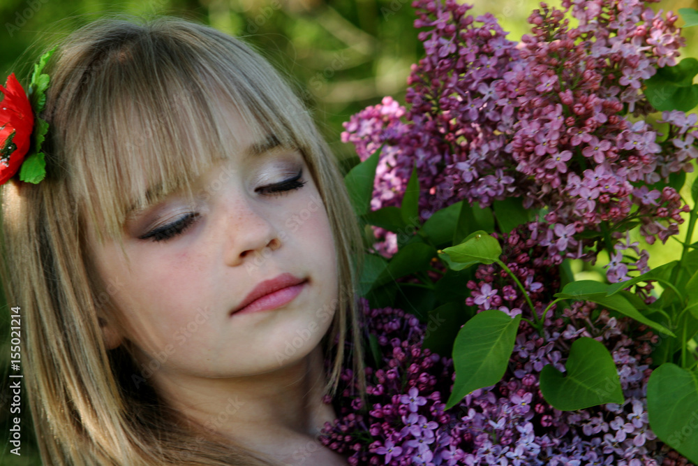 Gentle girl-spring with a bouquet of lilacs Gentle girl-spring with a bouquet of lilacs