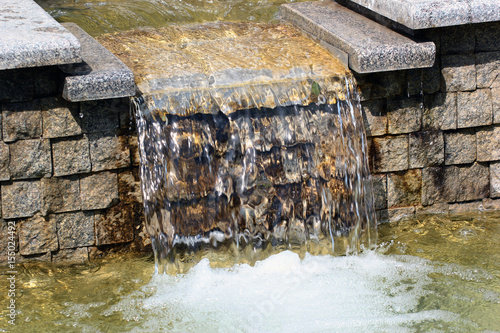 Fotografi Water cascade in a park