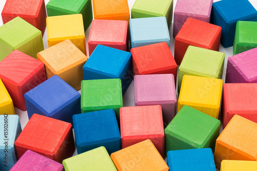 Colorful wooden toy cubes background