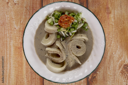 Laksam, special noodle with coconut gravy and fish. Asian traditional cuisine. photo